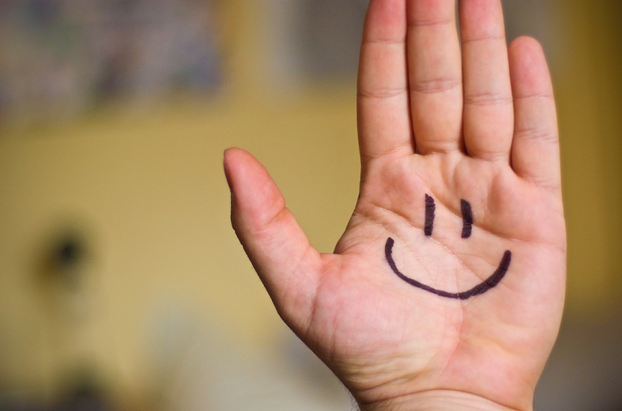 smiling hand, relief from wrist pain