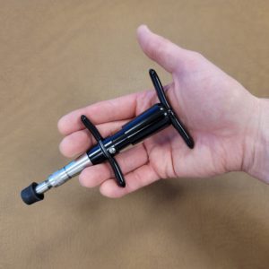 Chiropractic Adjusting Tool in hand